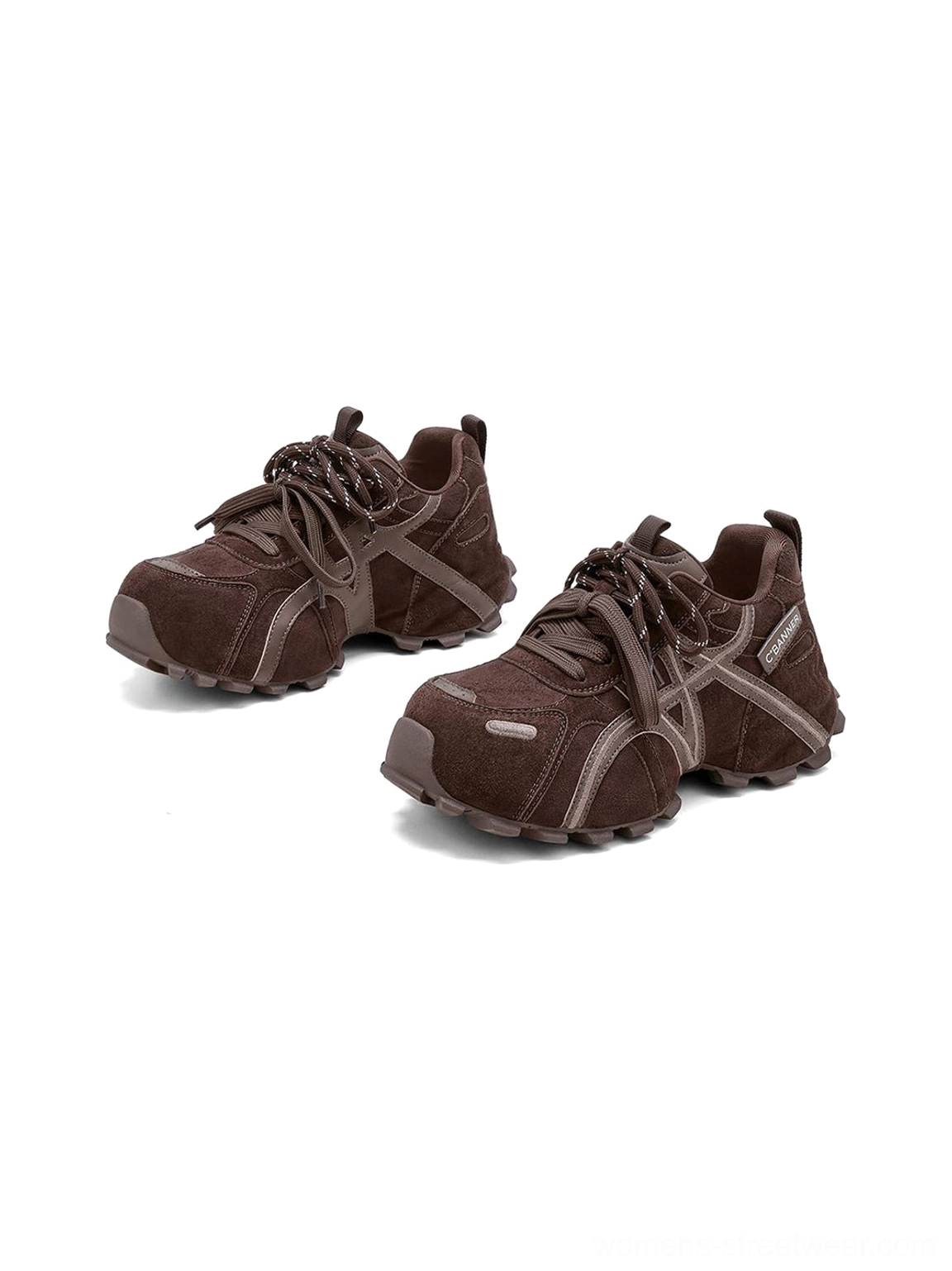 Women's brown cross-strap chunky trail runner sneakers featuring contrast webbing straps and deep lug sole for gorpcore styling