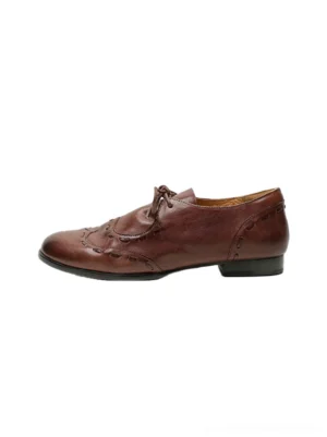 Burgundy brown genuine leather women's brogue lace-up shoes shown from above with perforated detailing and low-profile streetwear silhouette