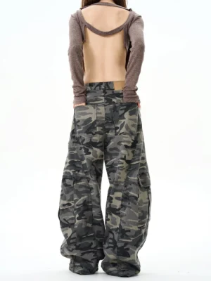 Back view of relaxed fit camouflage cargo pants for women showing the high-waisted construction and all-over woodland camo print