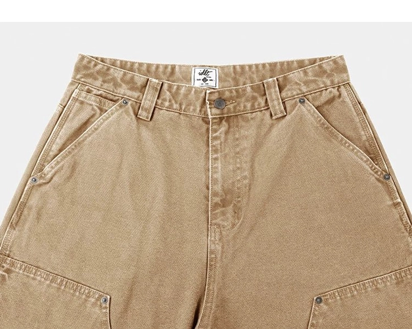 Women's carpenter denim streetwear pants product image showing relaxed utility workwear construction
