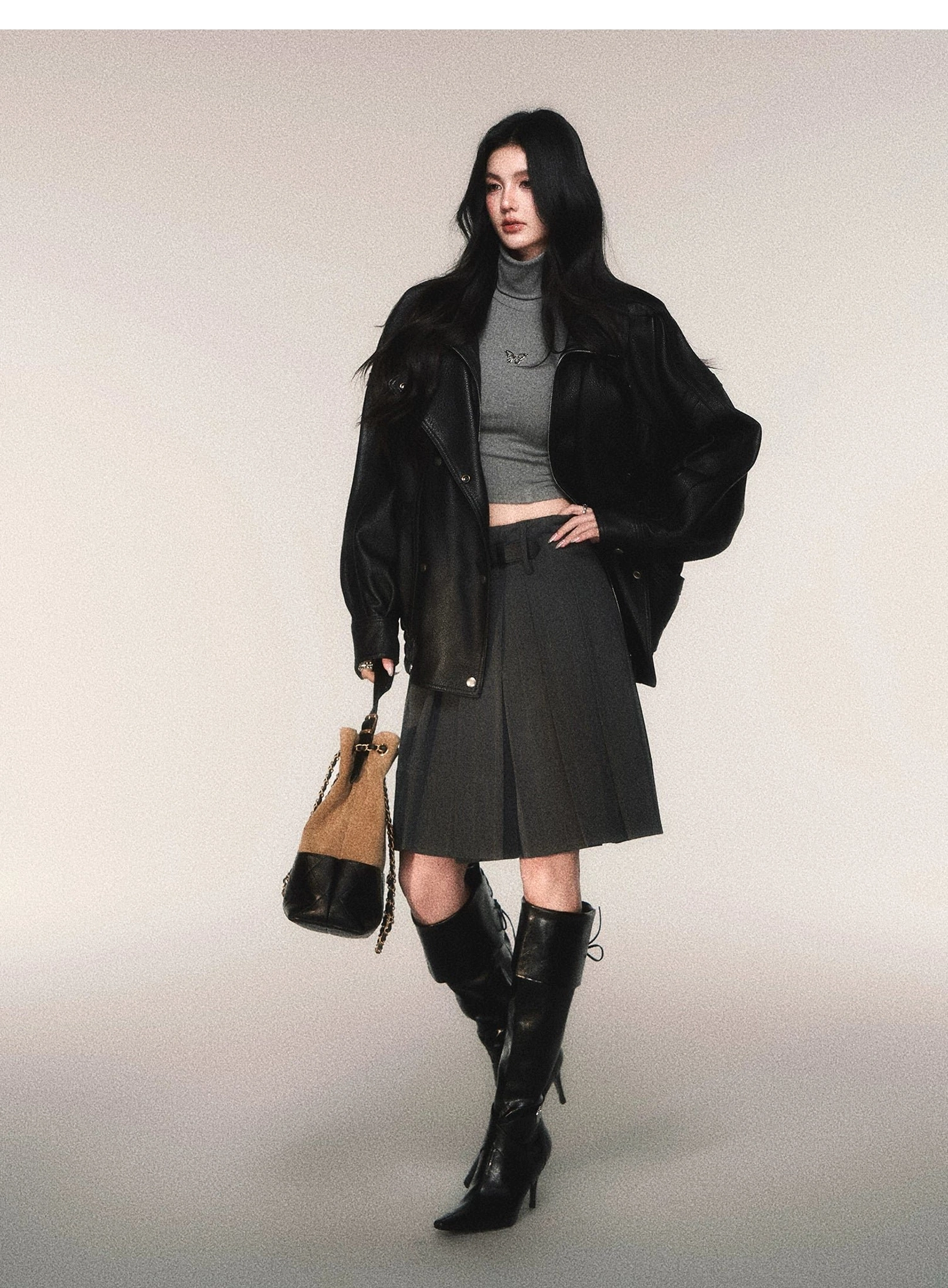 Women's charcoal pinstripe pleated midi skirt with structured A-line silhouette and removable buckle belt