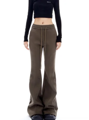 Coffee brown high-waisted flared lounge pants with drawstring waist and wide-leg streetwear silhouette shown from the front
