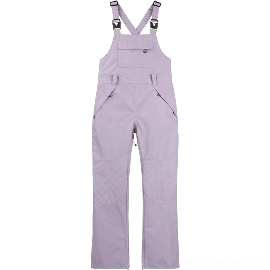 Light purple women's bib snow pants displayed flat with cross-back shoulder straps and multiple utility pockets