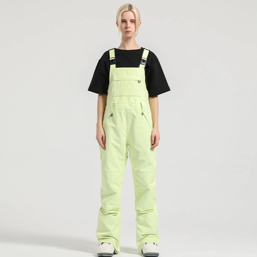 Fluorescent lime green women's bib snow pants with bold colorblock styling and relaxed straight-leg silhouette