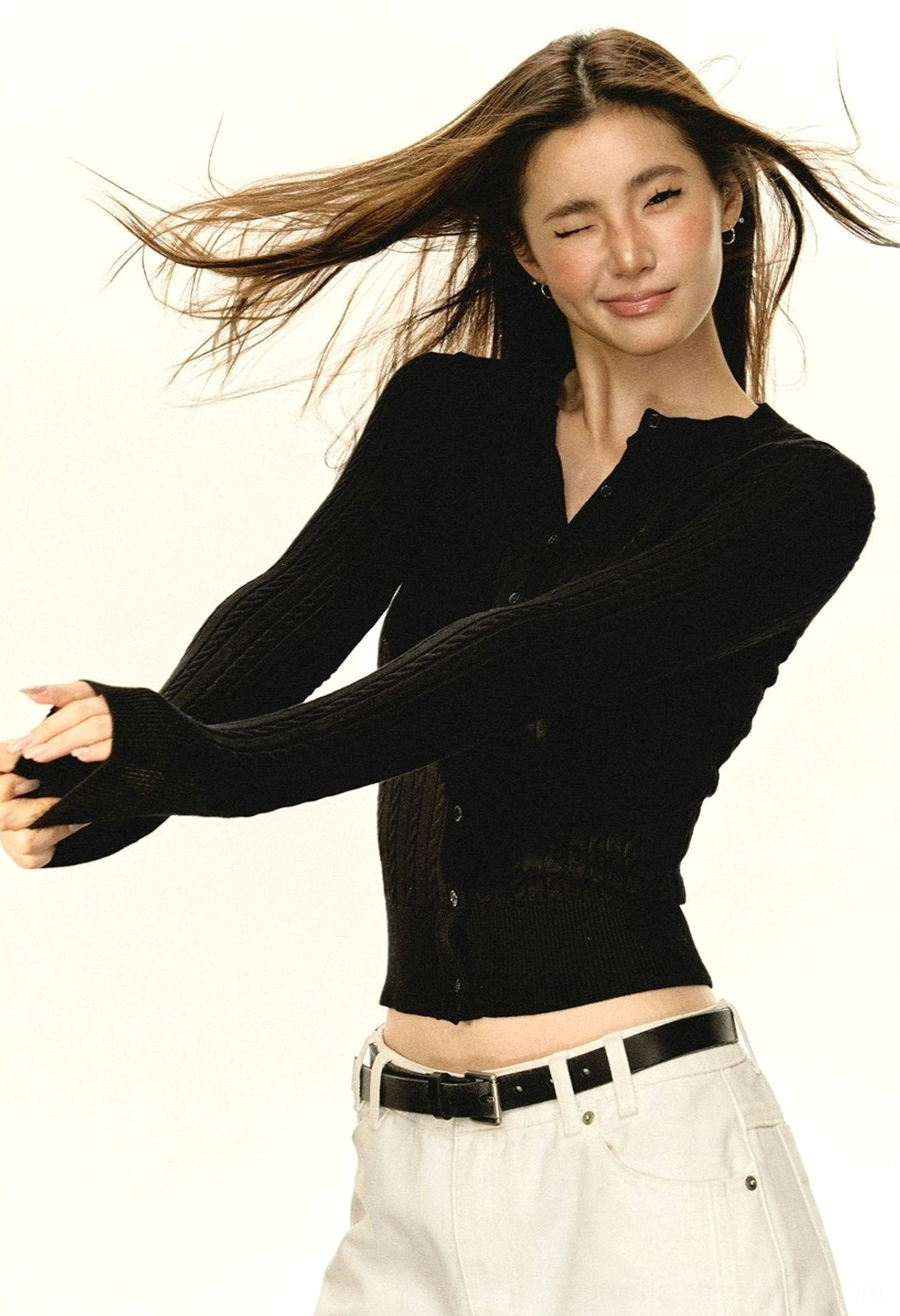 Women's slim cropped cable knit cardigan styled as a button-front knit top