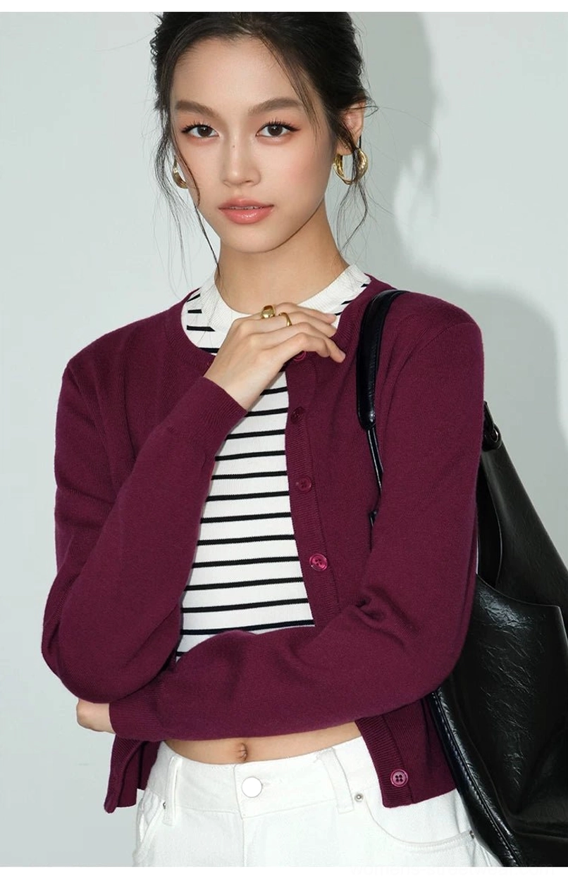 Women's soft cropped button front knit cardigan with classic crew neckline and fitted silhouette