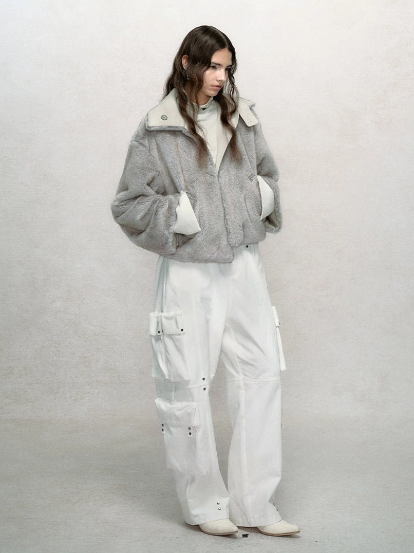Women's cropped faux fur bomber jacket for wide-leg denim, cargo pants, boots, and layered Korean streetwear outfits