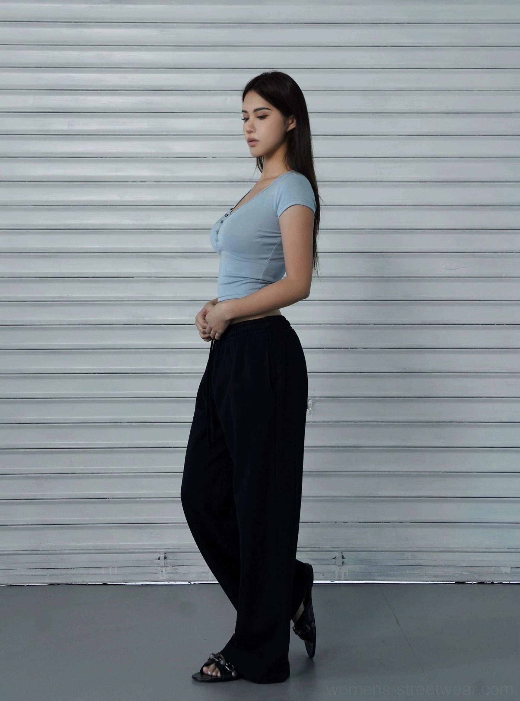 Cropped Henley baby tee for women showing fitted waist length and Seoul inspired streetwear silhouette