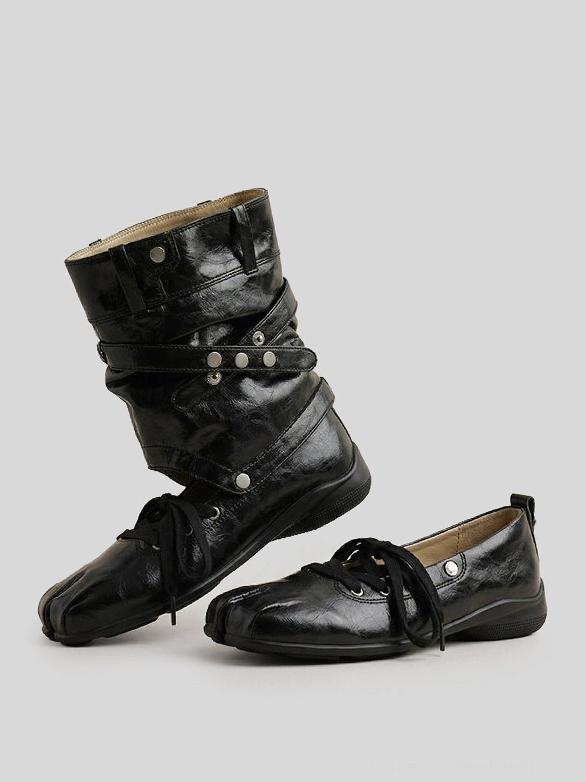 Women's black square-toe utility sandal boots displayed with cutout shaft, crinkled upper and buckle strap accents