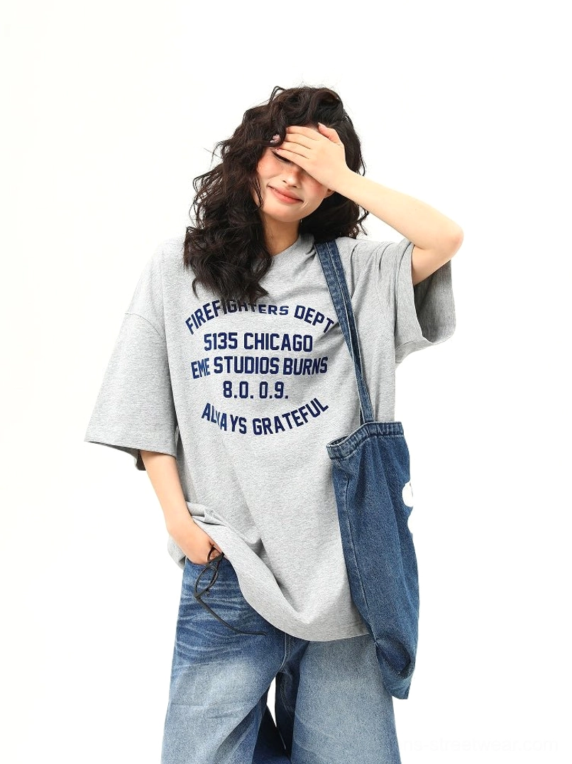 Women’s drop shoulder gray Chicago firefighter lettering T-shirt with dark blue vintage inspired chest print