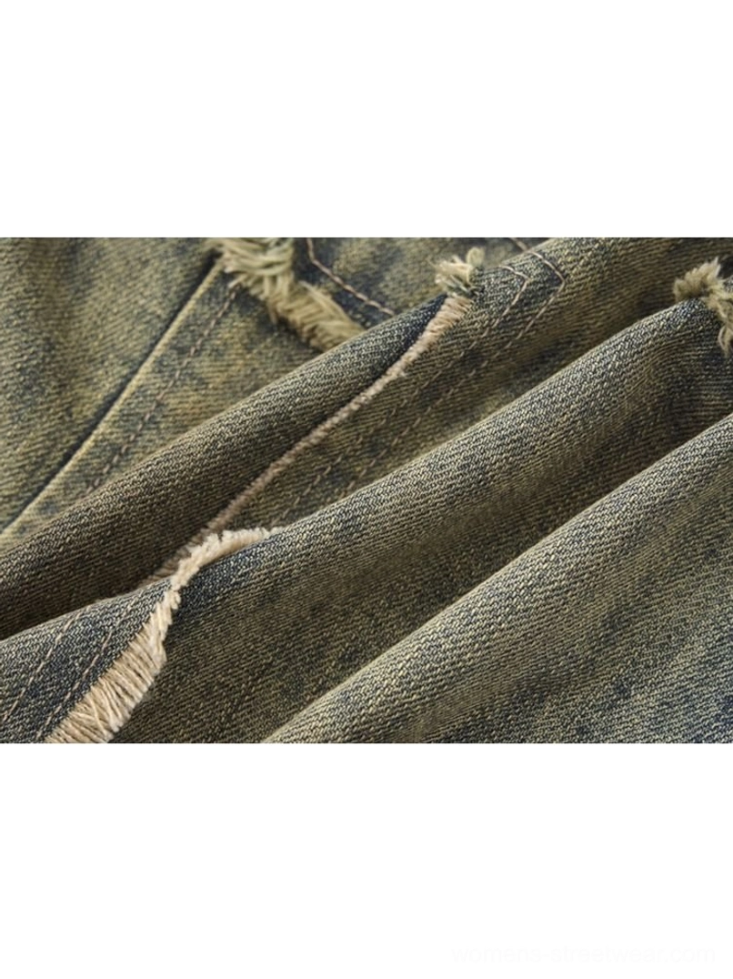 Women’s fitted distressed denim corset jacket with front zip closure and raw-edge styling