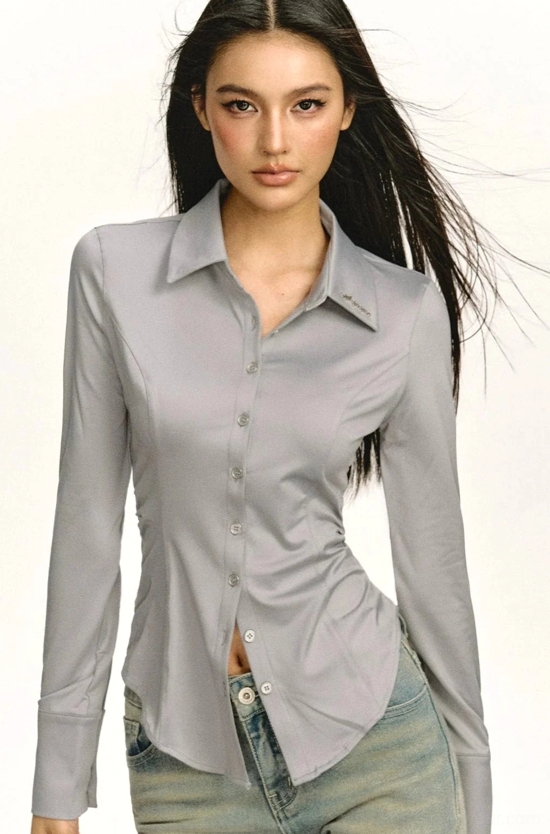 Women's gray fitted workwear shirt with waist darts and clean front button closure