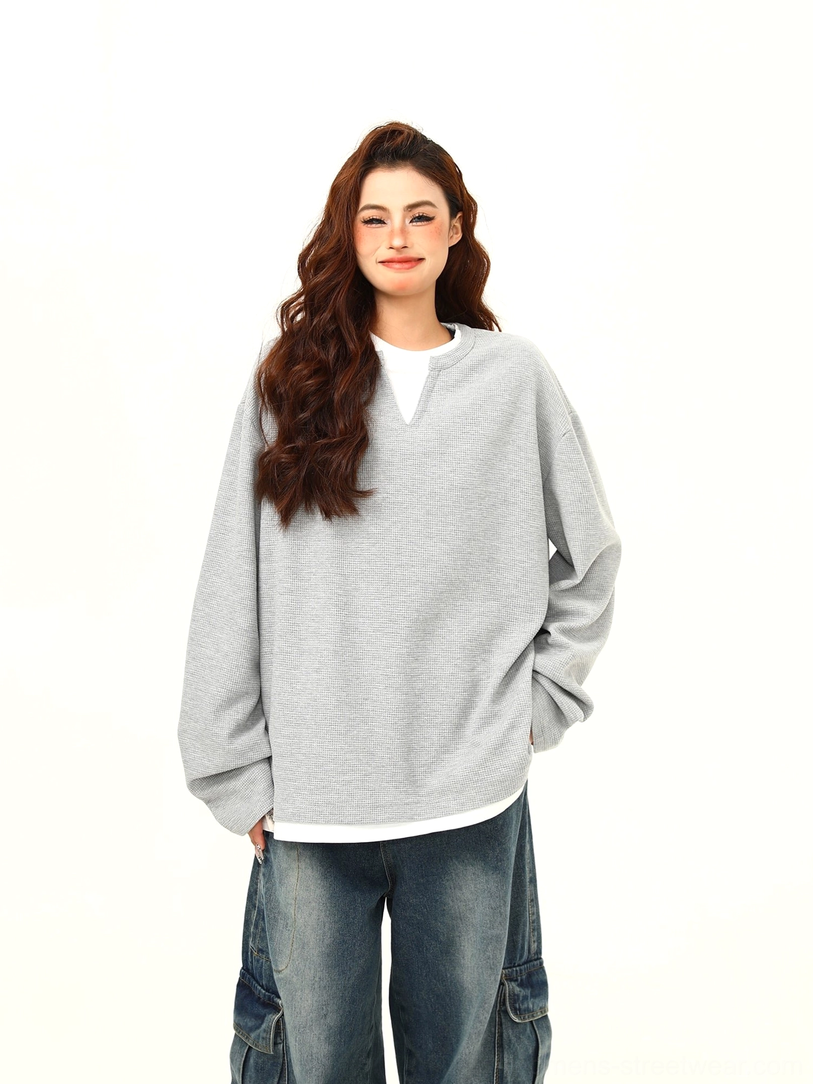 Heather gray layered hem waffle knit Henley oversized streetwear pullover front view styled with vintage cargo jeans