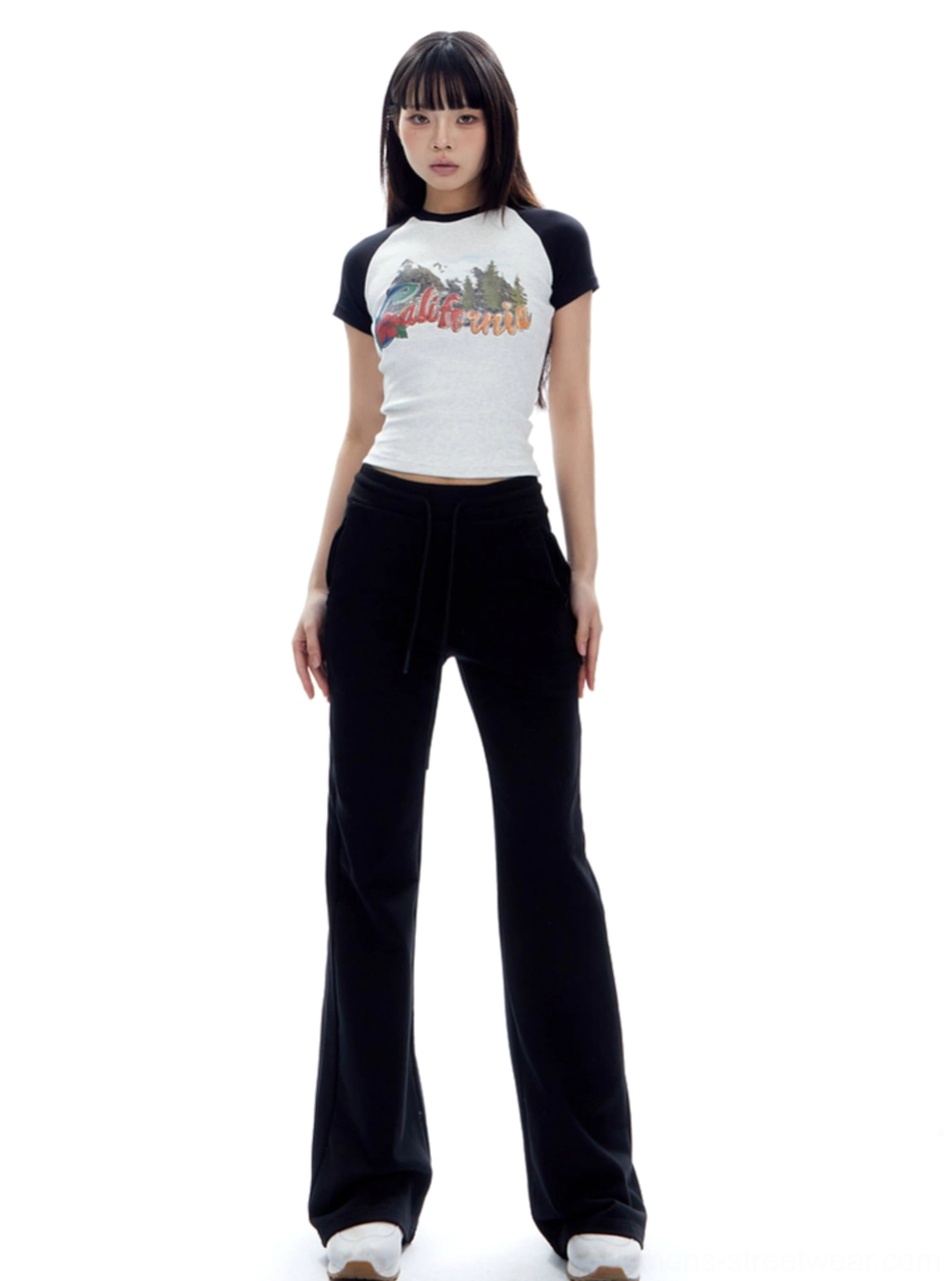 Women's high-waist flared sweatpants showing the relaxed lounge-to-streetwear silhouette and practical styling