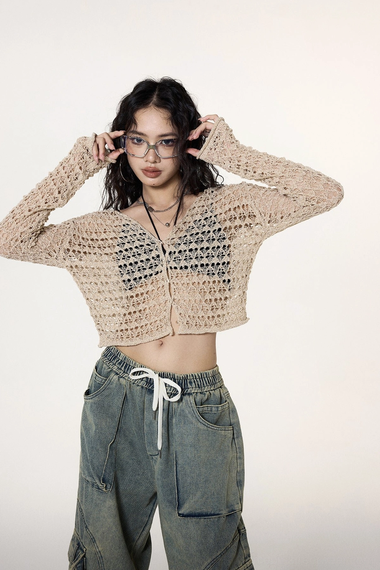 Women's khaki crochet crop cardigan product image with a V-neckline, front buttons, and Y2K streetwear styling