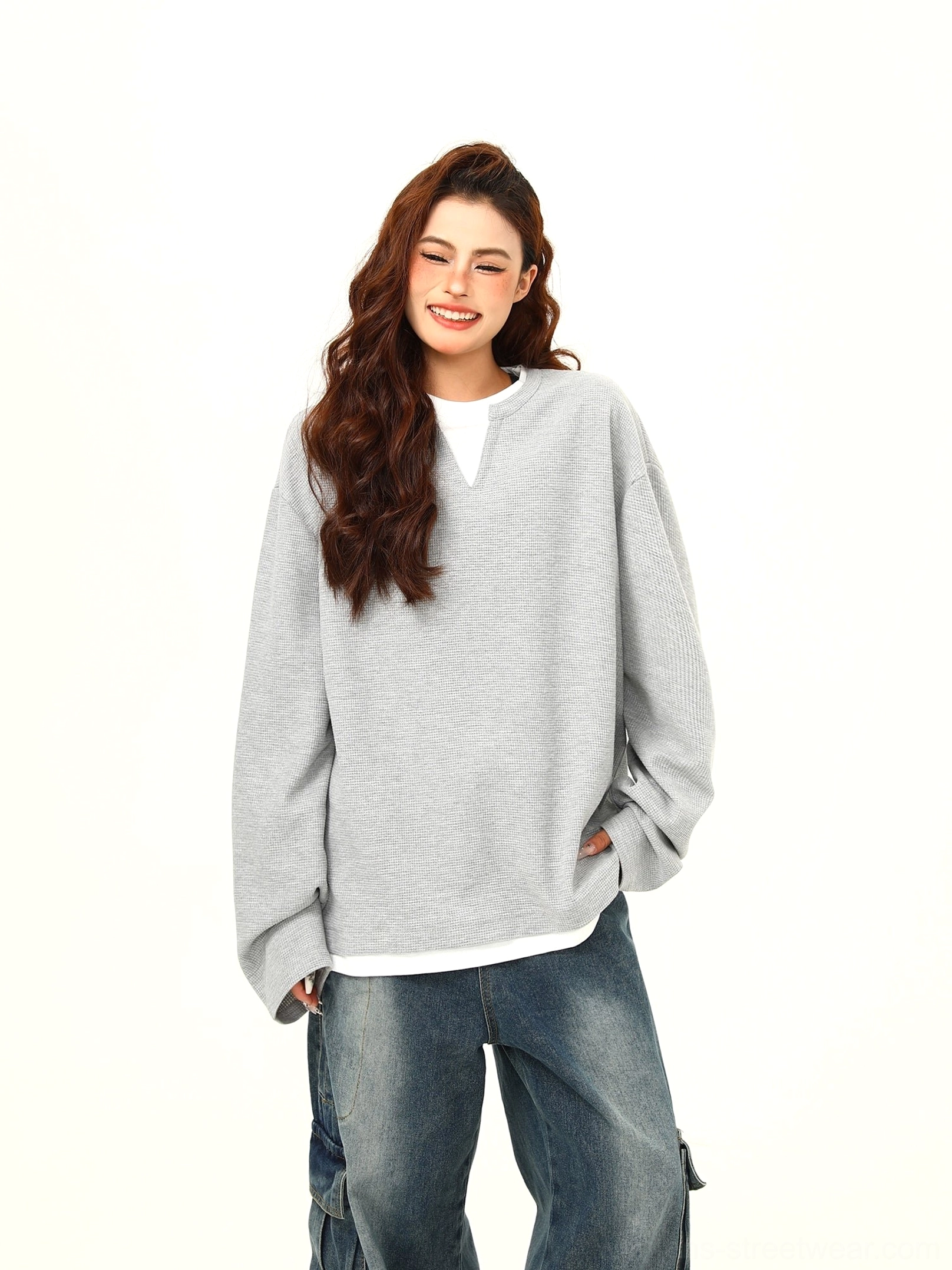 Women's layered hem waffle knit Henley oversized streetwear pullover product detail view