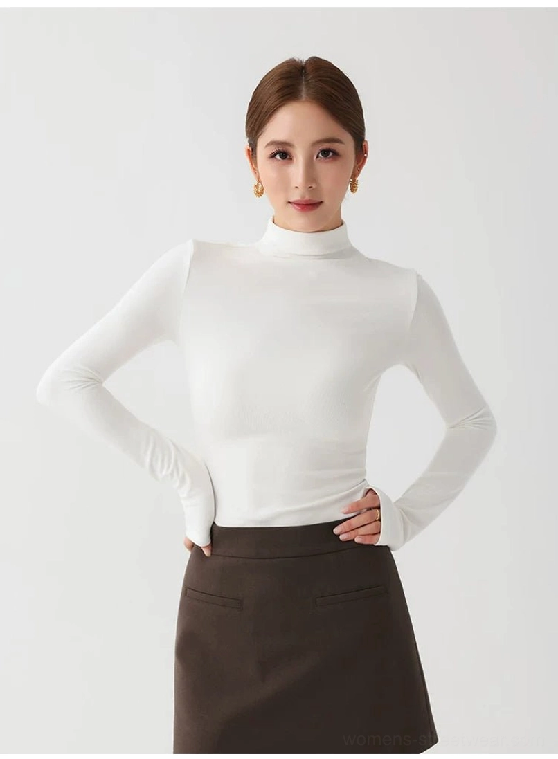 Women's lightweight mock neck stretch knit top with sleek body skimming silhouette