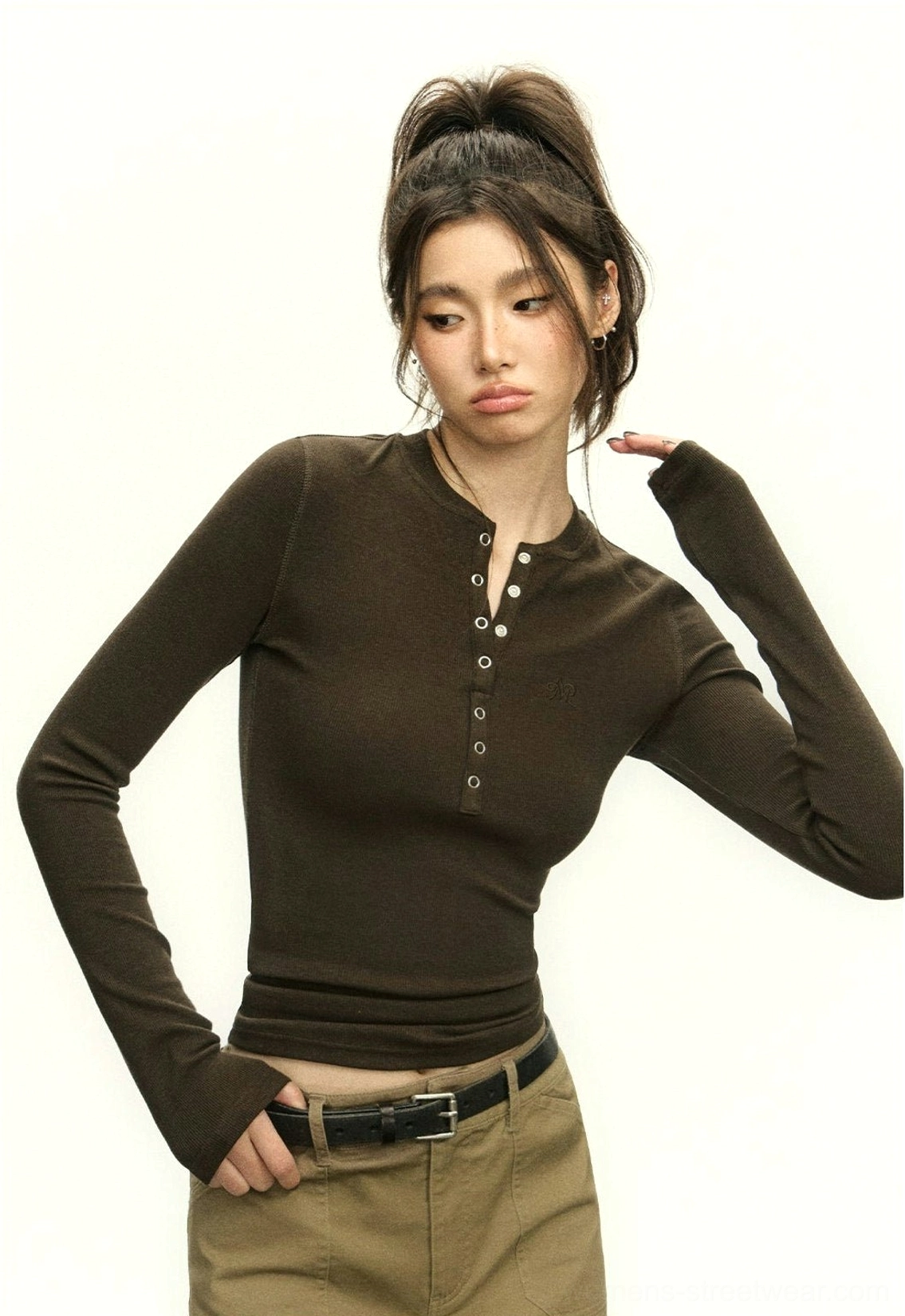 Women's long-sleeve ribbed Henley crop top with textured knit finish and streamlined waist-length silhouette
