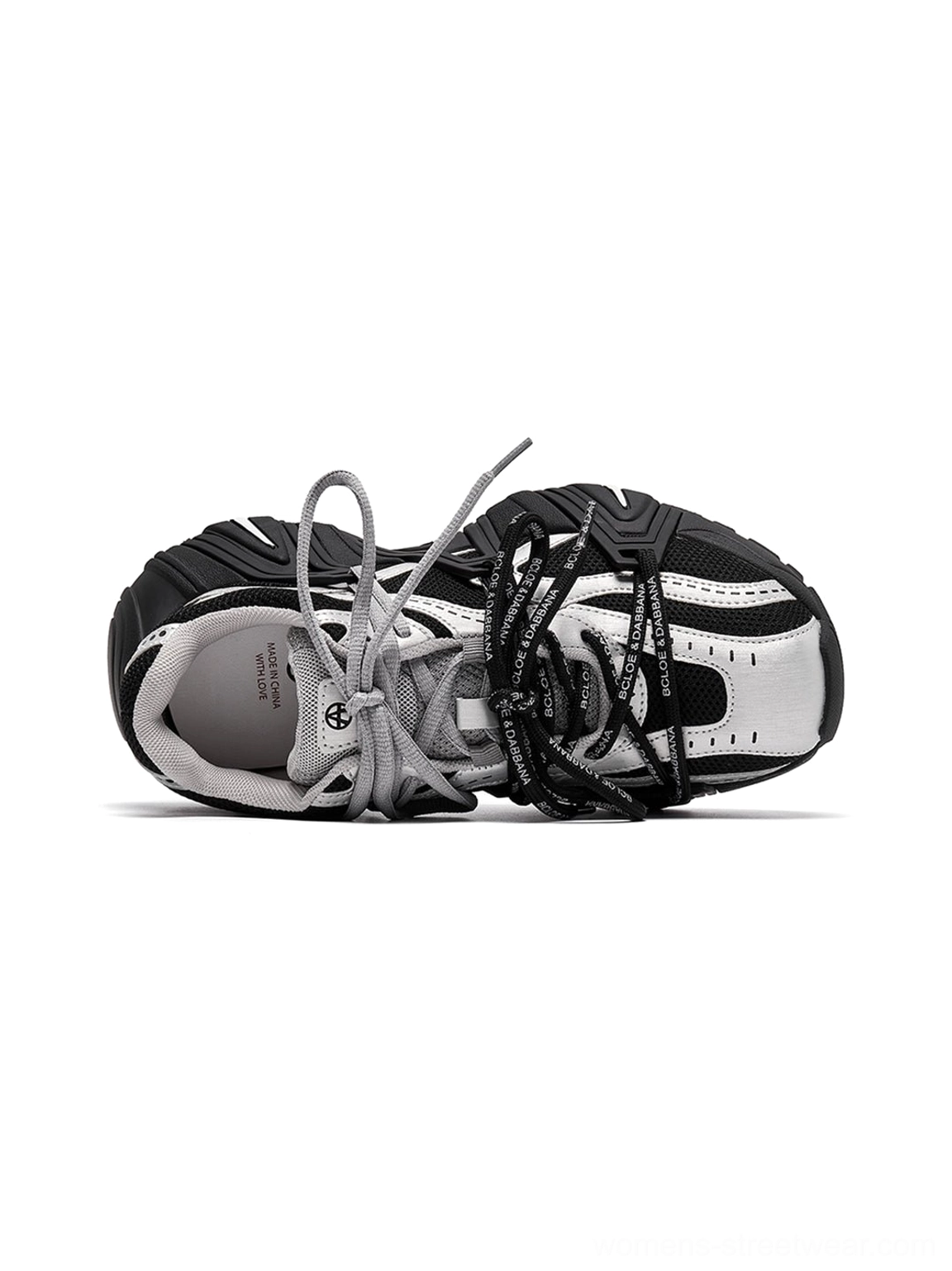 Women's mesh cage runner sneakers product image showing segmented sole construction and streetwear-ready shape
