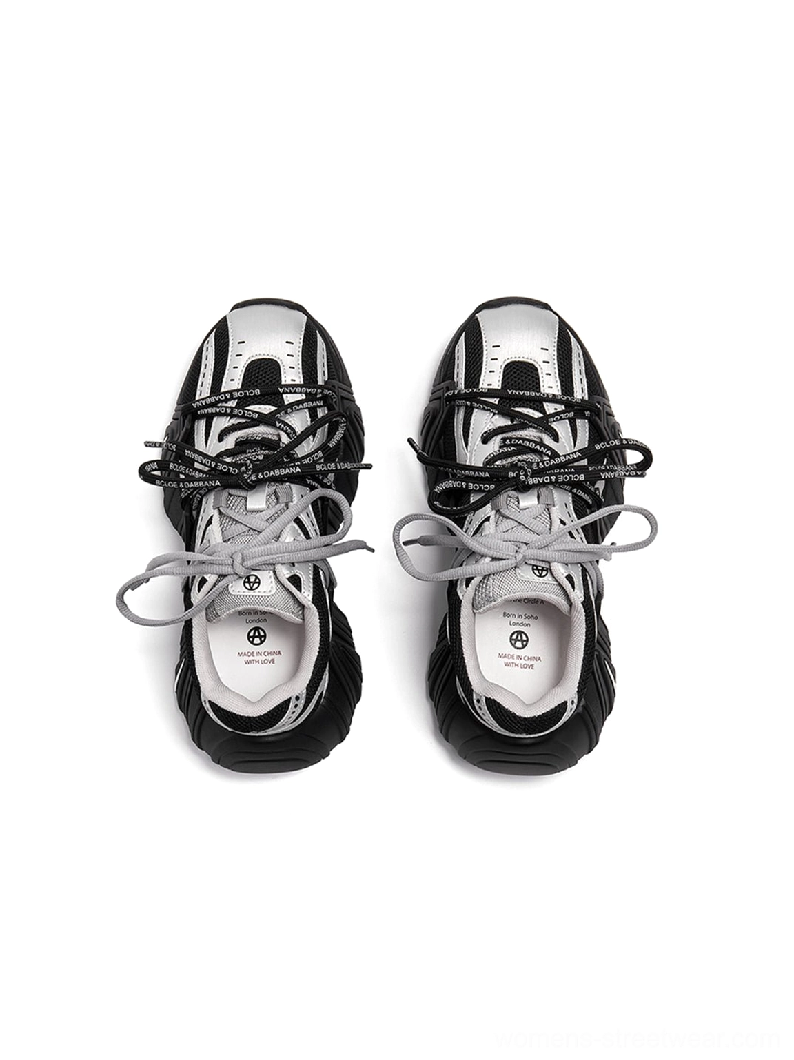 Women's mesh cage runner sneakers close-up showing synthetic overlay cage and textured rope lace construction
