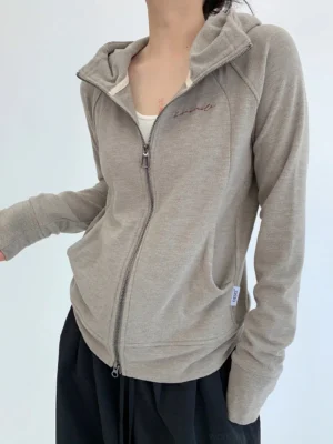 Women's Apricot Coffee mushroom script fitted zip hoodie front close-up with raglan sleeves and chest embroidery
