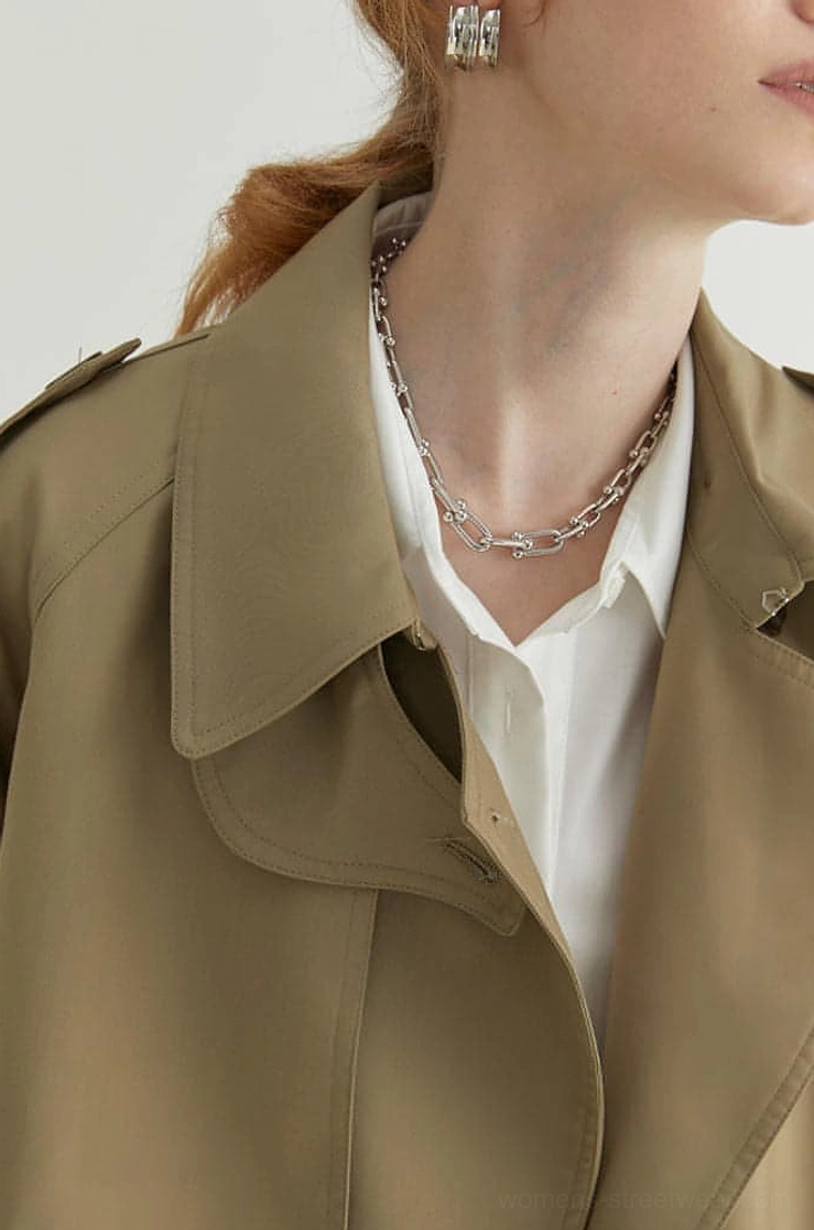 Women's oversized double-breasted melton trench coat with adjustable belt and classic lapel detail