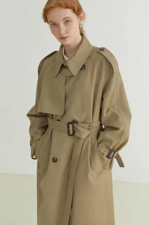 Women's oversized khaki double-breasted belted melton trench coat front full body streetwear look