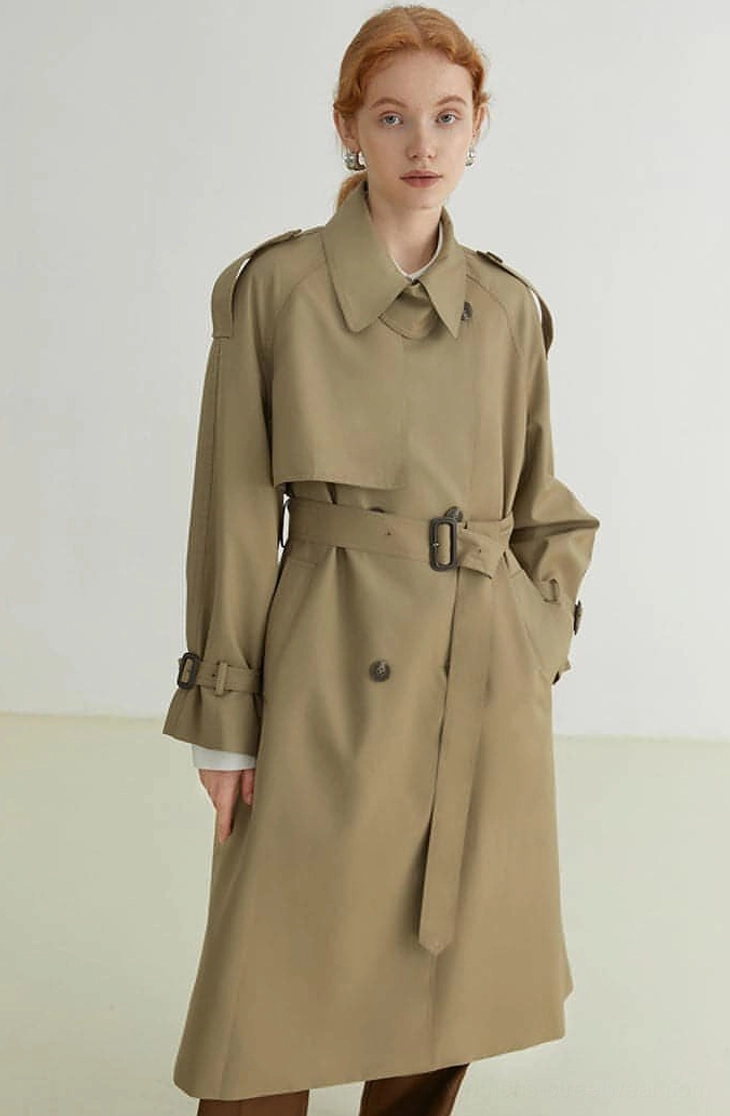Women's khaki oversized double-breasted trench coat with epaulets belt and adjustable cuff straps