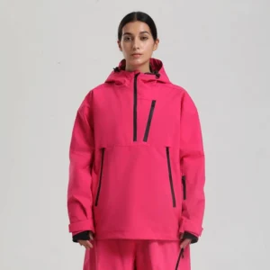 Women’s oversized waterproof ski anorak jacket in hot pink with contrast black zippers and matching snow pants front view