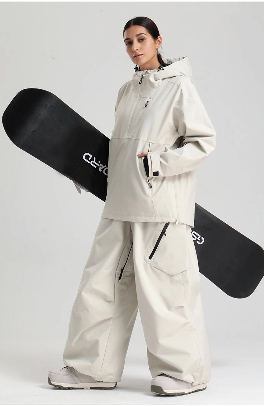 Women’s oversized waterproof ski anorak jacket inner powder skirt snow protection detail