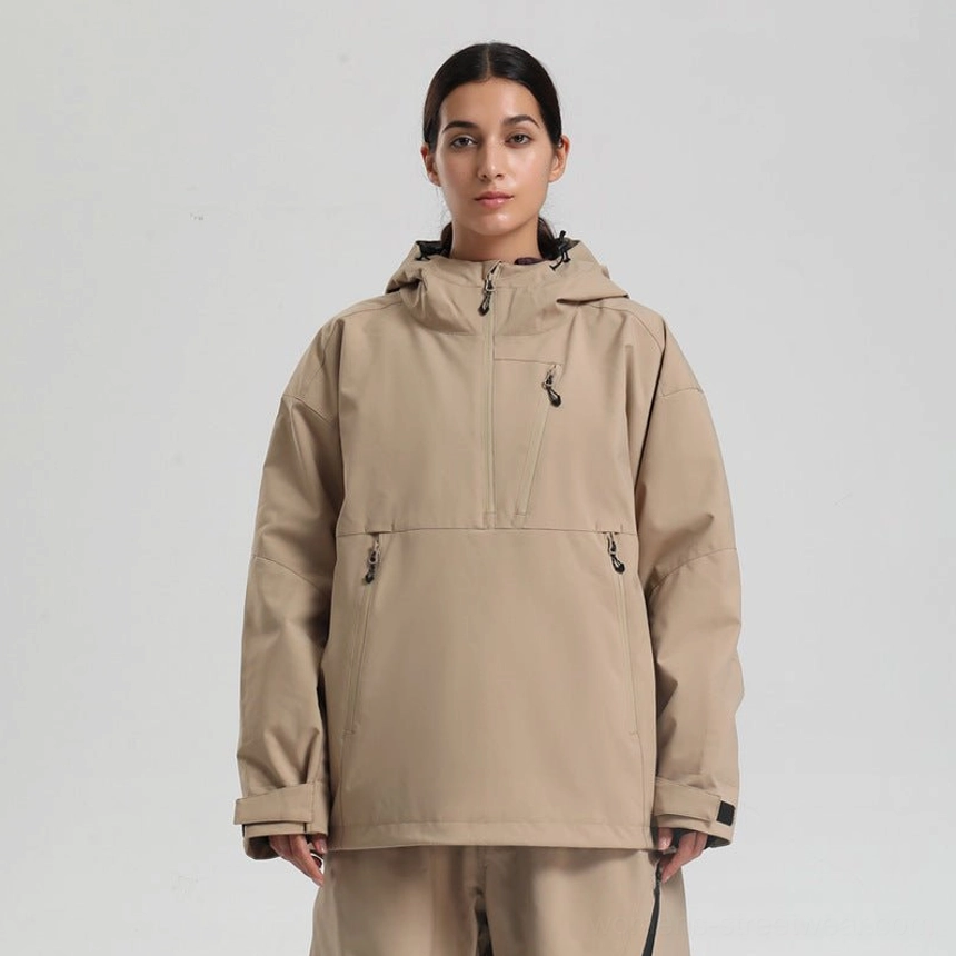 Women’s khaki tan oversized pullover ski anorak jacket with attached hood and relaxed snowboarding fit