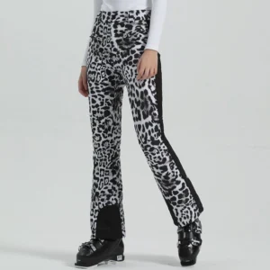 Women’s patterned slim flare ski pants with black side stripe and tailored boot cuffs shown in a studio setting