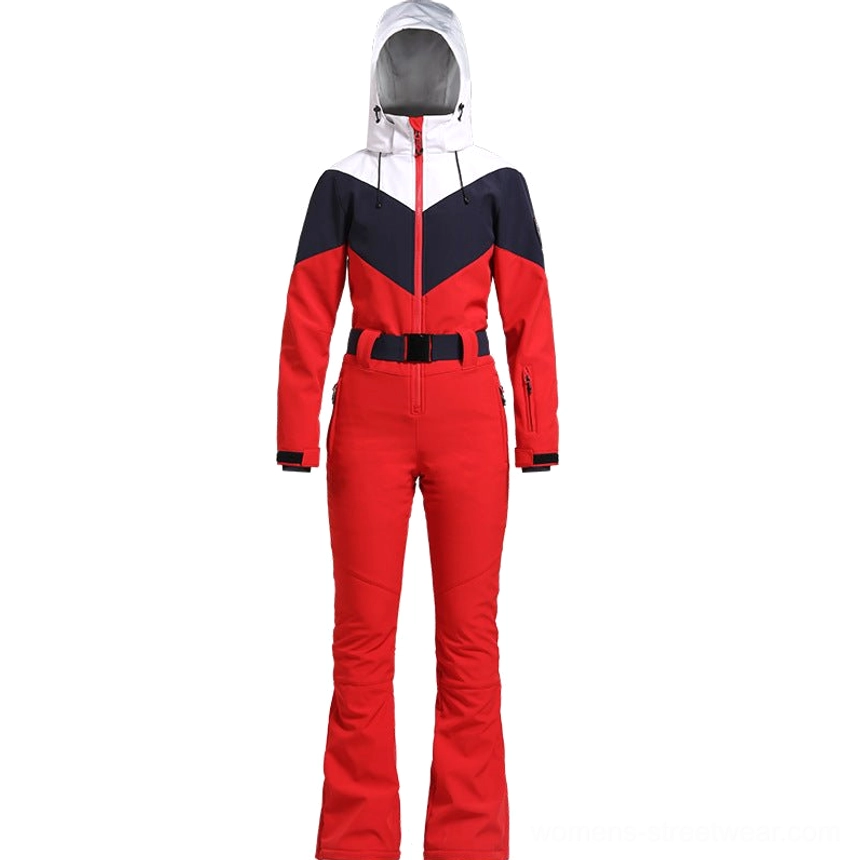 Women's red navy colorblock one-piece ski suit shown from the front with white collar panel flared red pants and black waist belt