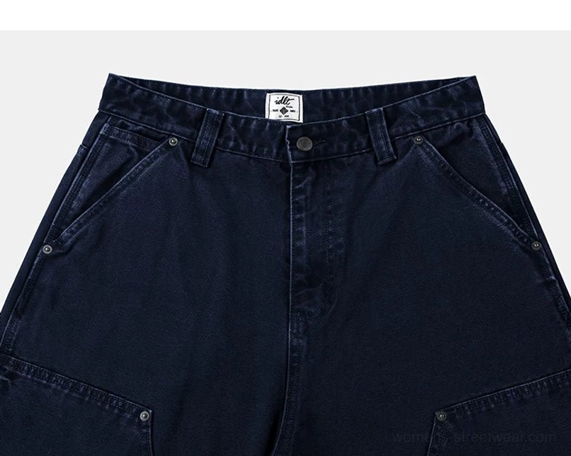 Women's relaxed carpenter pants with cotton workwear fabric, utility pockets, and modern streetwear appeal