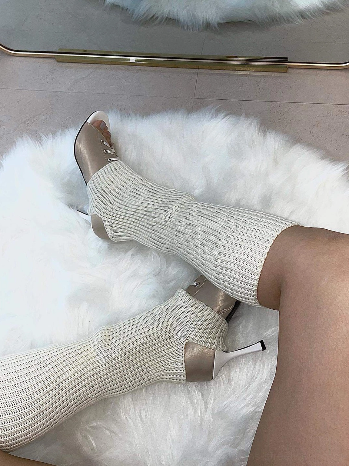 Women's satin lace-up peep-toe heels featuring ankle bootie styling and a slender high heel