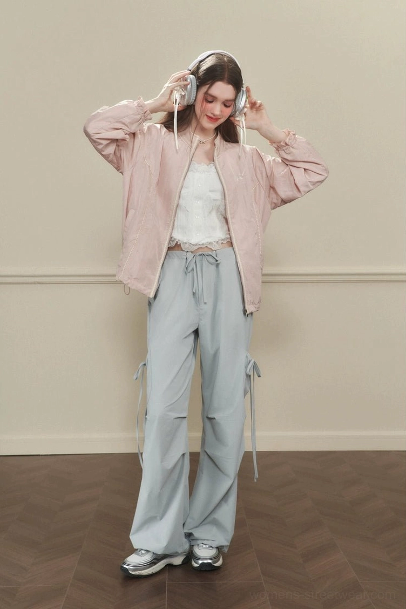 Women's side-tie wide-leg cargo pants with drawstring waist and utility pocket accents streetwear product view