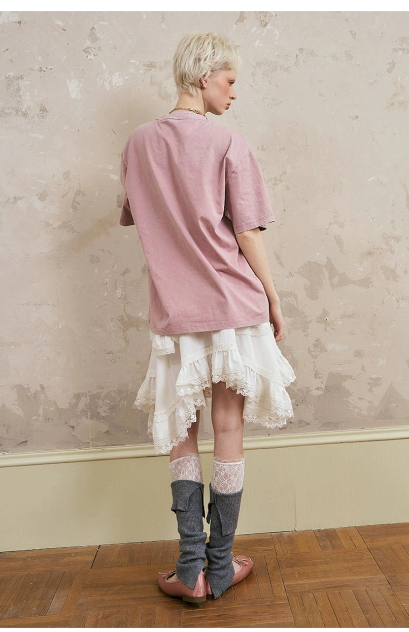 Women's sporty hooded jacket and lace midi skirt outfit with layered ruffles, contrast piping, bow embroidery, and relaxed streetwear styling