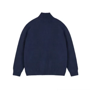 Dark blue stand collar wool cocoon cardigan for women shown from the back with raglan sleeves and ribbed hem