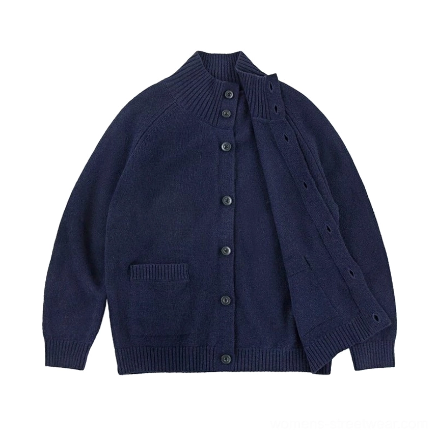 Dark blue women's stand collar RWS wool cocoon cardigan with button front patch pockets and ribbed hem front view
