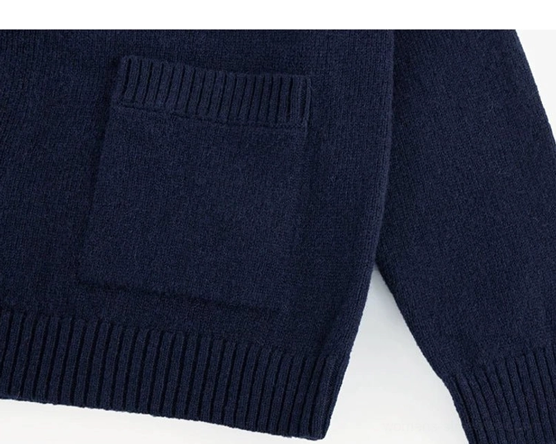 Dark blue RWS wool cardigan lower patch pocket ribbed cuff and hem close-up for women