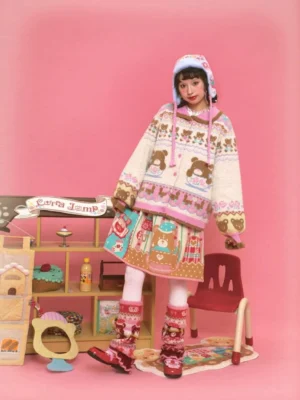 Women's Sweet Bear Tea Party cardigan styled with a pink Peter Pan collar, dessert jacquard knit pattern, fuzzy hem, and pastel streetwear outfit