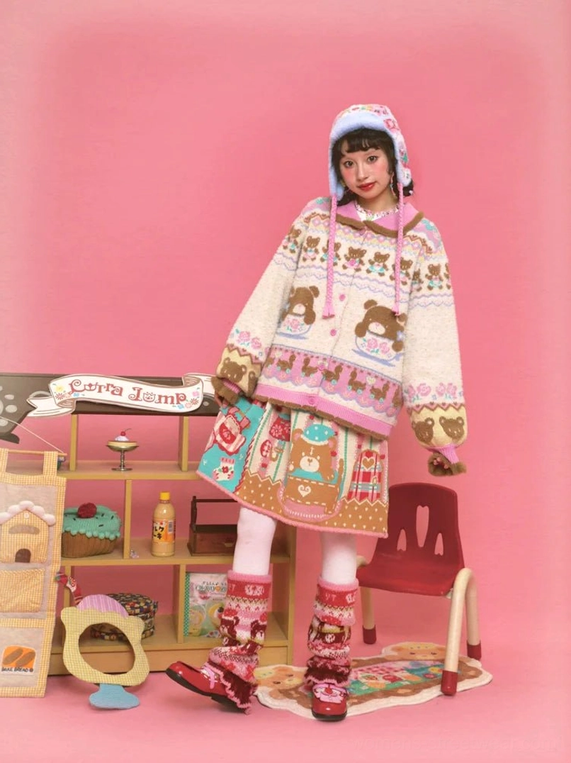 Women's Sweet Bear Tea Party cardigan styled with a pink Peter Pan collar, dessert jacquard knit pattern, fuzzy hem, and pastel streetwear outfit