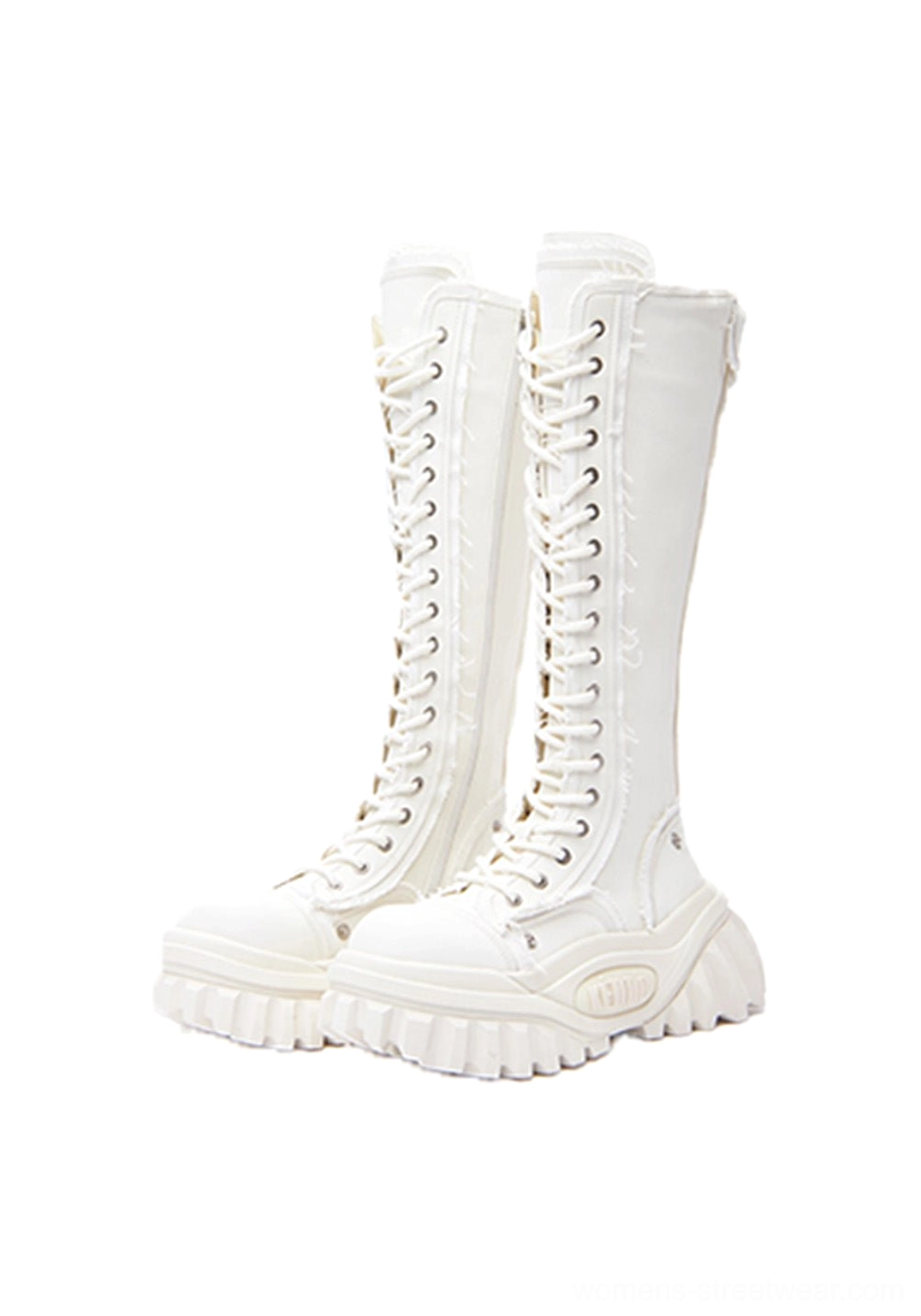 Women’s tall lace-up platform riding boots detail view highlighting the layered leather and canvas upper