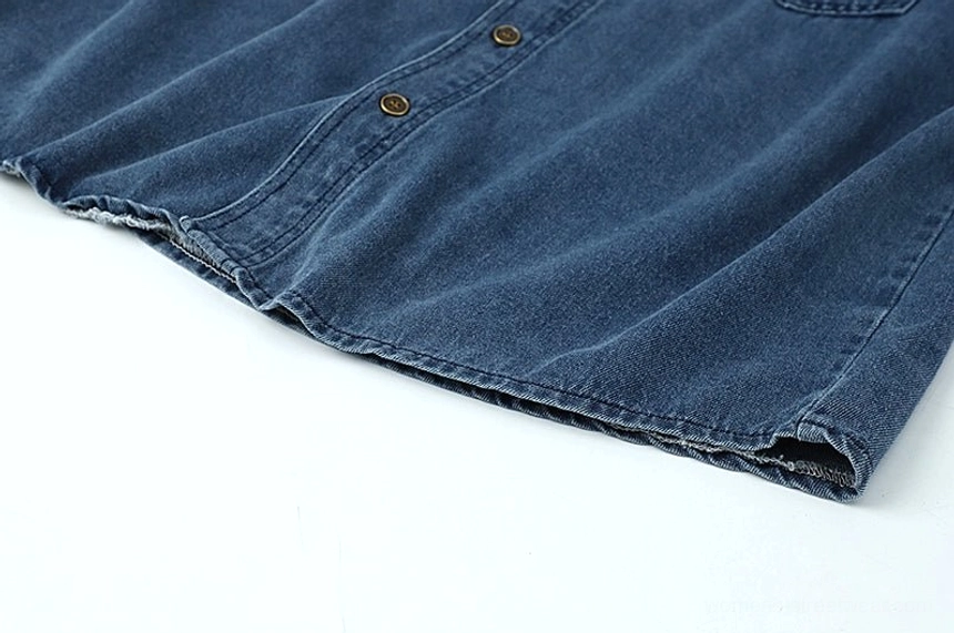 Women's vintage dark blue denim shirt jacket designed for layering over T-shirts, tanks, knitwear, and casual tops