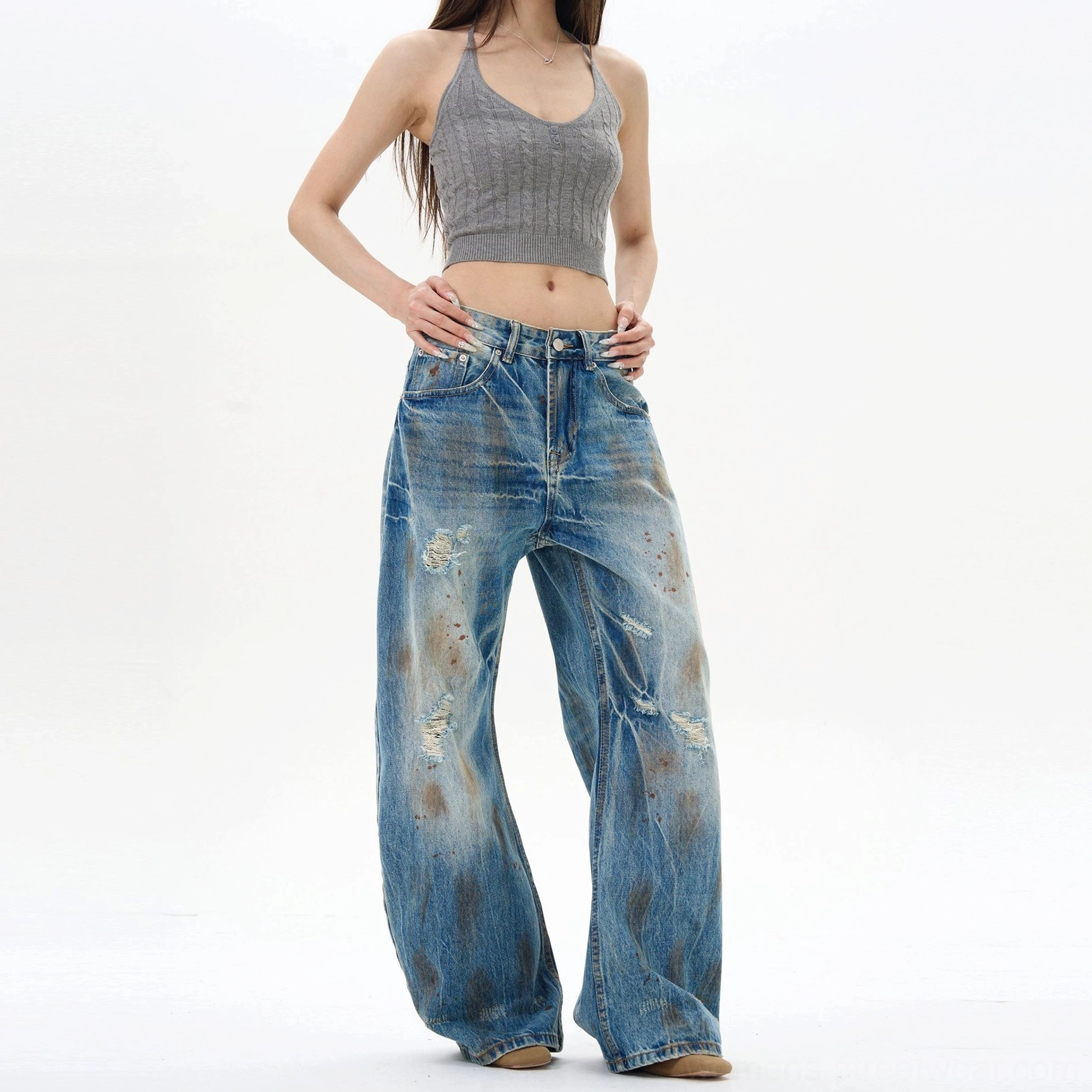 Full front view of women's vintage distressed wide-leg jeans in blue denim with high waist, ripped details, and Seoul-inspired streetwear styling