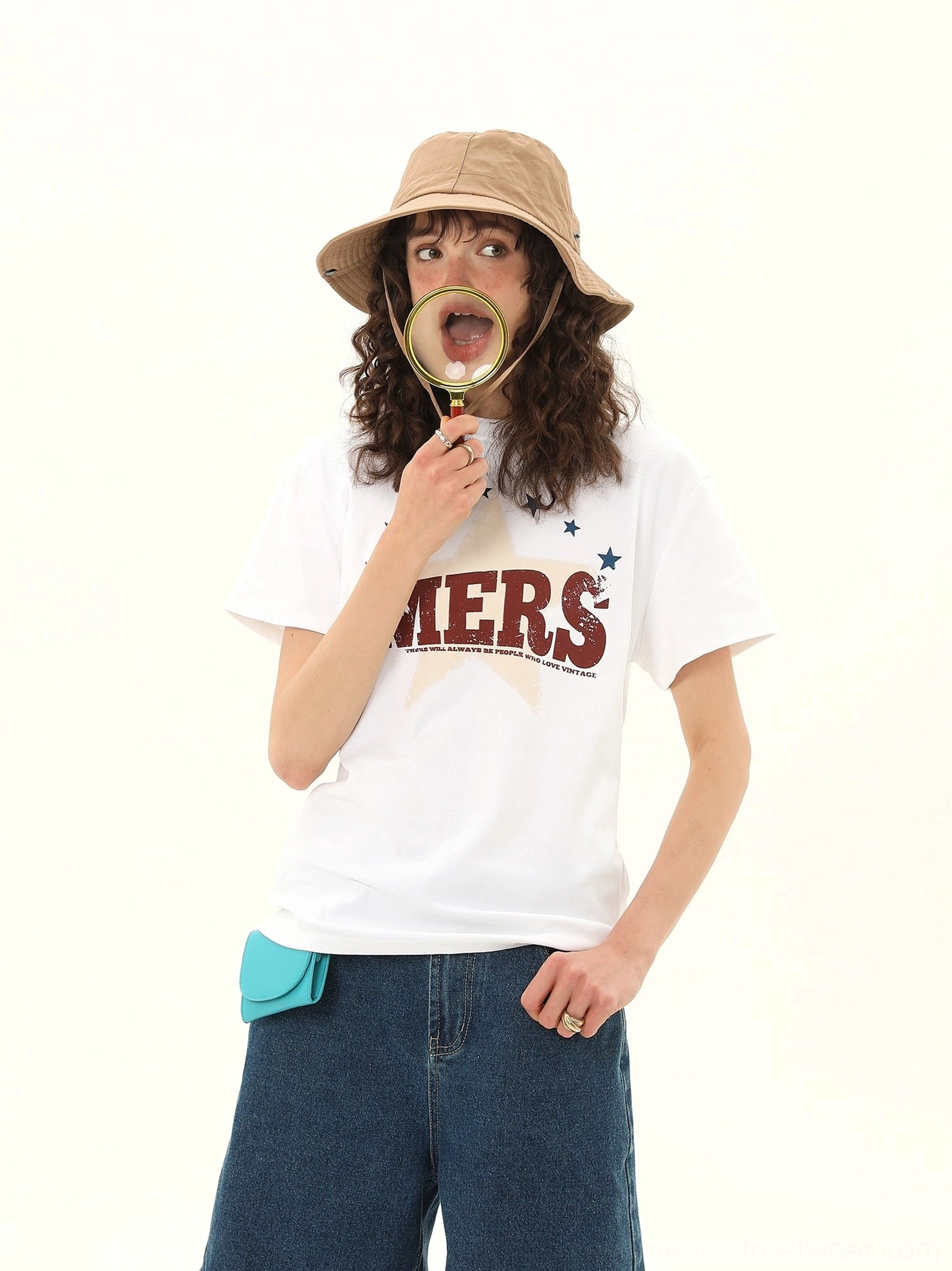 Women's white MERS star varsity graphic tee with retro distressed chest print and casual denim styling
