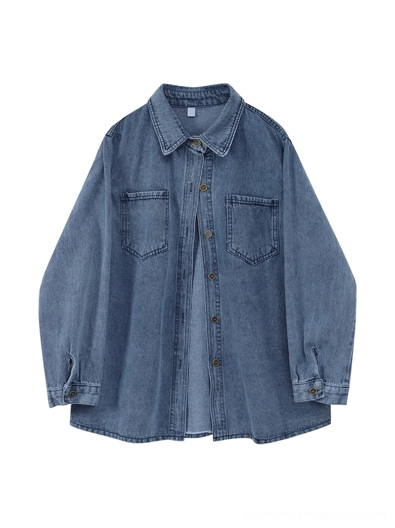Flat lay view of a women's washed dark blue denim shirt jacket with pointed collar, button front, chest pockets, and long sleeves