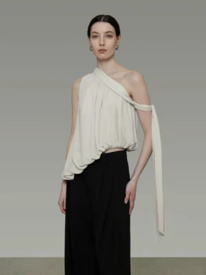 White asymmetric one-shoulder drape tank top with long shoulder tie and cropped relaxed silhouette