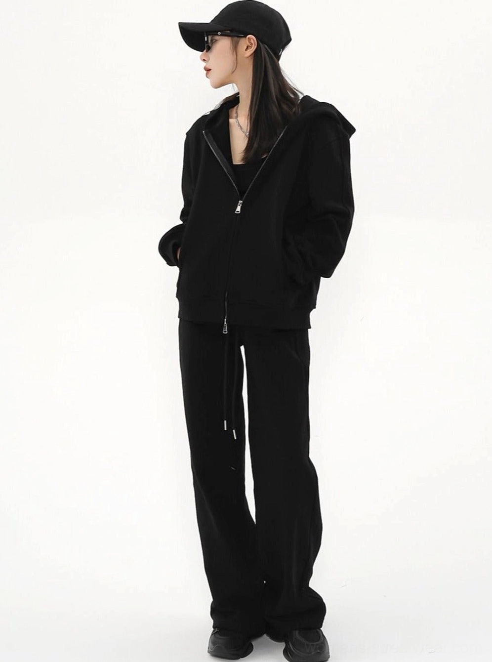 Women's zip-up hoodie jacket product image showcasing a clean oversized silhouette for everyday streetwear outfits