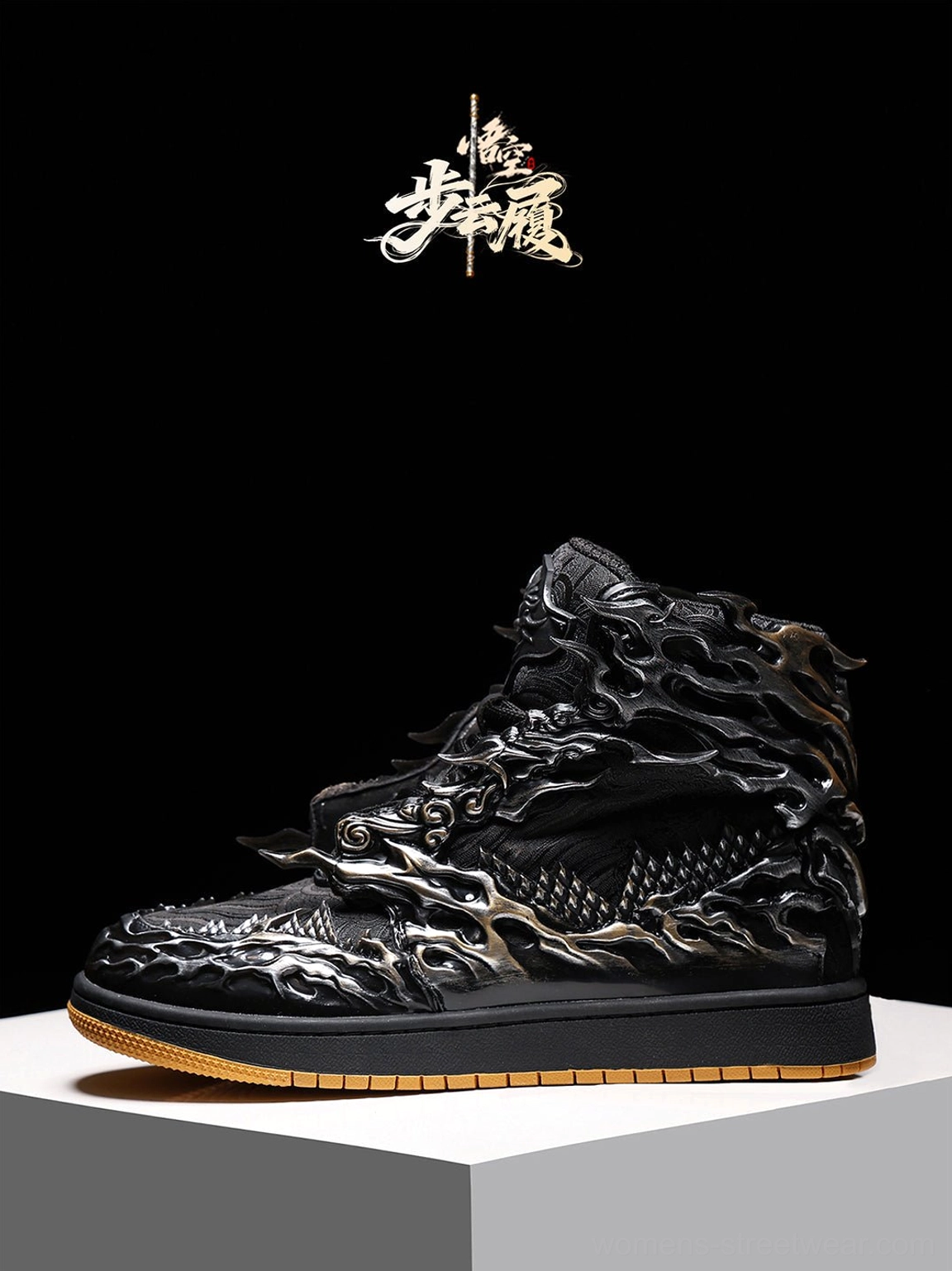 Black and silver Wukong cloud relief high-top sneaker on display showing embossed cloud pattern and gum outsole